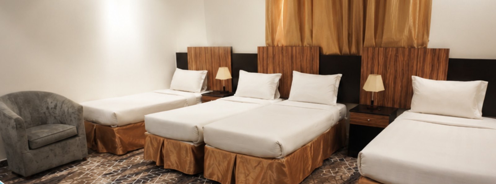 Guest room at Asrar Al-Tayseer Hotel